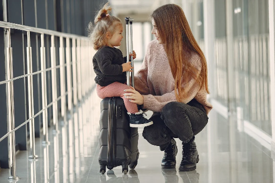 A mother with her child at the airport