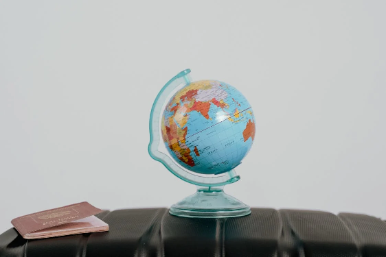 a passport and a globe